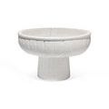 Front view of empty large white textured ceramic pedestal bowl on white background