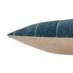 Side view highlighting pillow's cotton velvet chevron front and beige fabric back