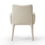 View from the rear illustrating chair’s straight back and upholstery wrapping
