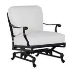Outdoor aluminum lounge chair with black lattice frame and white cushions