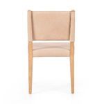 Rear view of Villa Dining Chair showing the wood frame and padded leather backrest