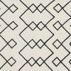 Adler Ivory Rug with black geometric diamond pattern on ivory background, textured high/low wool weave