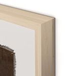 Close-up of natural wood frame corner showing grain and smooth finish