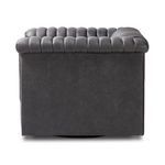 Back side view showing uninterrupted dark gray leather surface and channel top edge