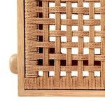 Close-up top view of the tightly woven seagrass seat with square pattern and wooden frame
