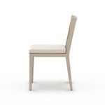 Opposite side profile highlighting straight teak legs and rope support on backrest