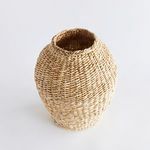 Abaca teardrop vase viewed from a higher angle showing the hollow interior and woven rim
