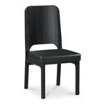Single Kerr dining chair angled slightly right showing padded seat and carved backrest