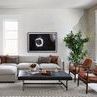 Lindy Coffee Table the Rialto Ebony leather top shown with modern furniture and decor