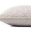 Side profile view of Liv pillow showing thickness and woven texture across the surface