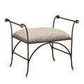 Three-quarter angle showing full shape, arm details, and textured steel frame with brass accents