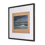 side angle view emphasizing thin depth of black distressed pine frame around ocean wave painting