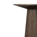 Side detail view showing dark elm tapered base with wood grain and texture