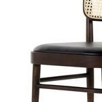 Macro view of smooth black polyfoam seat material used on Court Dining Chair