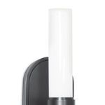 Close-up focusing on upper section of Dixon Single Sconce white cylindrical glass shade