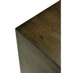 Macro view of rich wood grain on table surface with warm brown finish