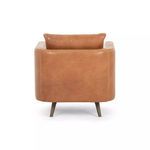 Rear view of Kaya chair showing seamless leather back and tapered wooden legs