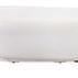 Side view of white pebble coffee table showing its low profile and smooth edge curve