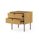 Dark stained nightstand with drawers slightly open showing interior craftsmanship