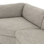 Up-close of seat cushion overlap at corner point with visible fabric weave