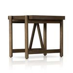 Side angle highlighting thick top and engraved wood grain on table surface
