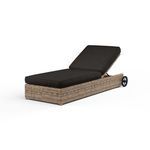 Havana Adjustable Chaise in weathered tobacco wicker with black cushioned upholstery and adjustable backrest, side view