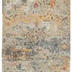 Vintage style Cristobol rug with a medallion starburst pattern in muted blues, yellows, reds, and oranges