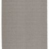 Handwoven indoor/outdoor gray rug with textured striped pattern in solid muted gray hue