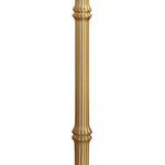 Close-up of brass lamp stem showing textured ring details