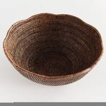 Top-down view showing the scalloped edge and detailed woven interior of the bowl