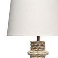 Close-up of white fabric lamp shade showing texture and slight weave pattern