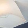 Close-up detail of the overlapping edges and soft texture of the frosted glass shade on Netherlee Flush Mount