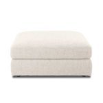 Back view of ottoman with smooth fabric surface and low-profile feet