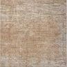 Wyatt Spice / Silver area rug with a distressed, earthy tan and silver pattern in a soft polypropylene blend