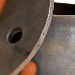 Close-up of Hazel Serving Bowl lid edge showing textured ceramic surface and circular handle hole