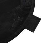 Two black wooden bowls shown upright with interior texture and distinctive handles