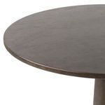 Overhead view of tabletop showing dark oak veneer with diagonal wood grain pattern