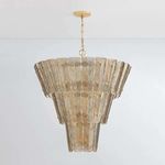 Cassian Chandelier with layered, tapered panels featuring a chevron texture in a golden metallic finish