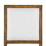 Top down view of square upholstered back with visible fine fabric texture and wood frame
