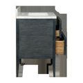 Side view highlighting textured vertical rattan pattern on vanity side panel with drawers ajar