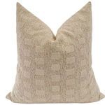 Creamy beige pillow cover with subtle textured pattern and soft, plush fabric, square shape