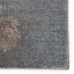 Close-up of corner area featuring rich blue and brown textured pattern