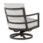 Back corner angle showing curved frame detail and white cushions