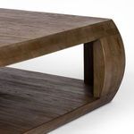 Side angle showing detailed joinery where curved side pieces meet top and base