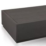 Close-up of clean lines and smooth finish on rectangular metal outdoor table corner