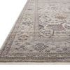 Low angle perspective emphasizing rug thickness and detailed border patterns