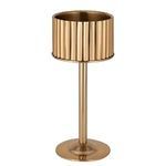 Side angle of the gold steel ice bucket on stand displaying a smooth circular base