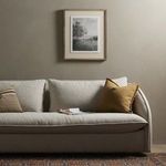 Landscape Study III displayed above sofa in warm neutral toned living room interior