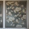 Close-up front view of a single Drifting Blooms II painting showing floral details against shiplap wall