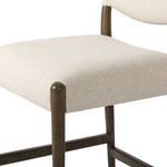 Close-up of seat cushion and rounded wood post with high-performance fabric